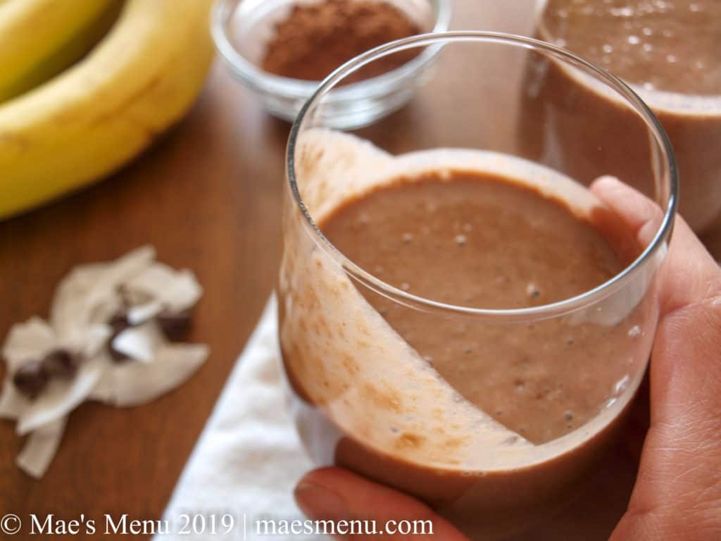 Healthy chocolate smoothie with banana and coconut. 