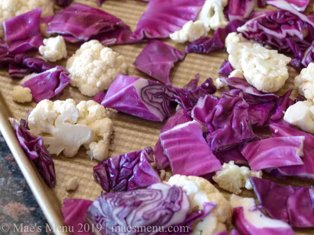 Chunks of cabbage and cauliflower ready to roast. 