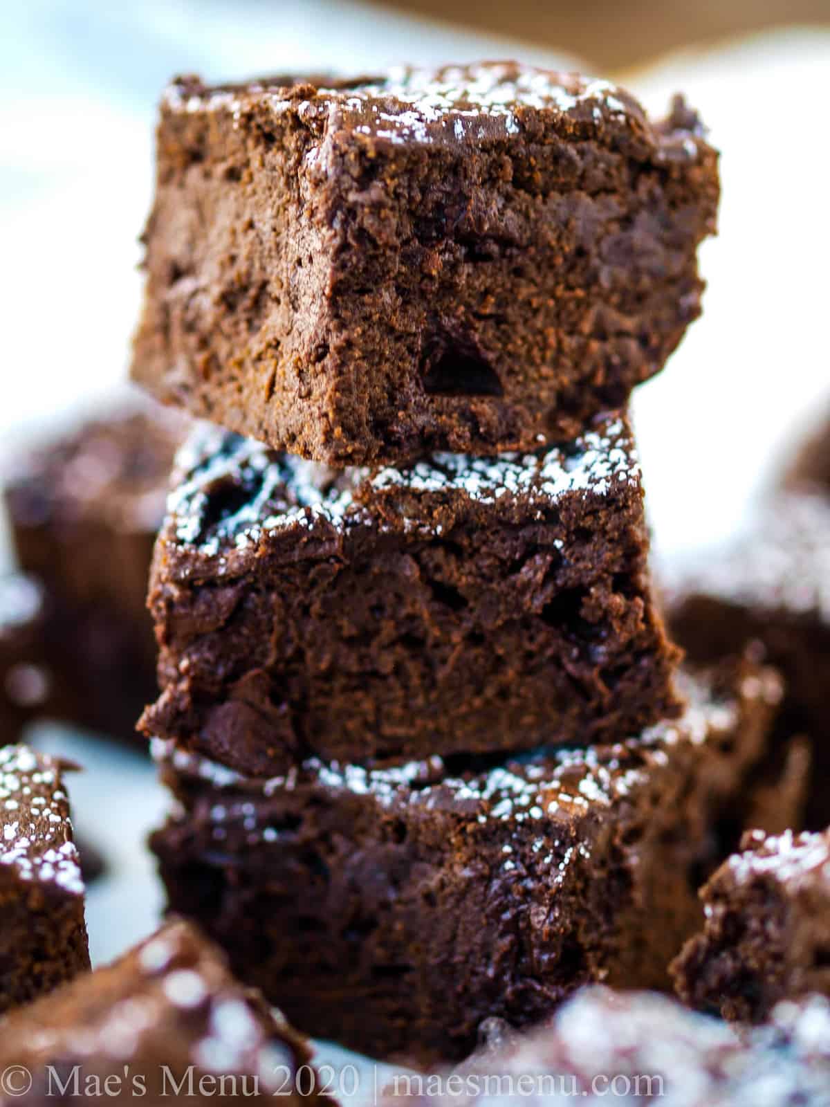 A stack of fudgy date and black bean brownies.