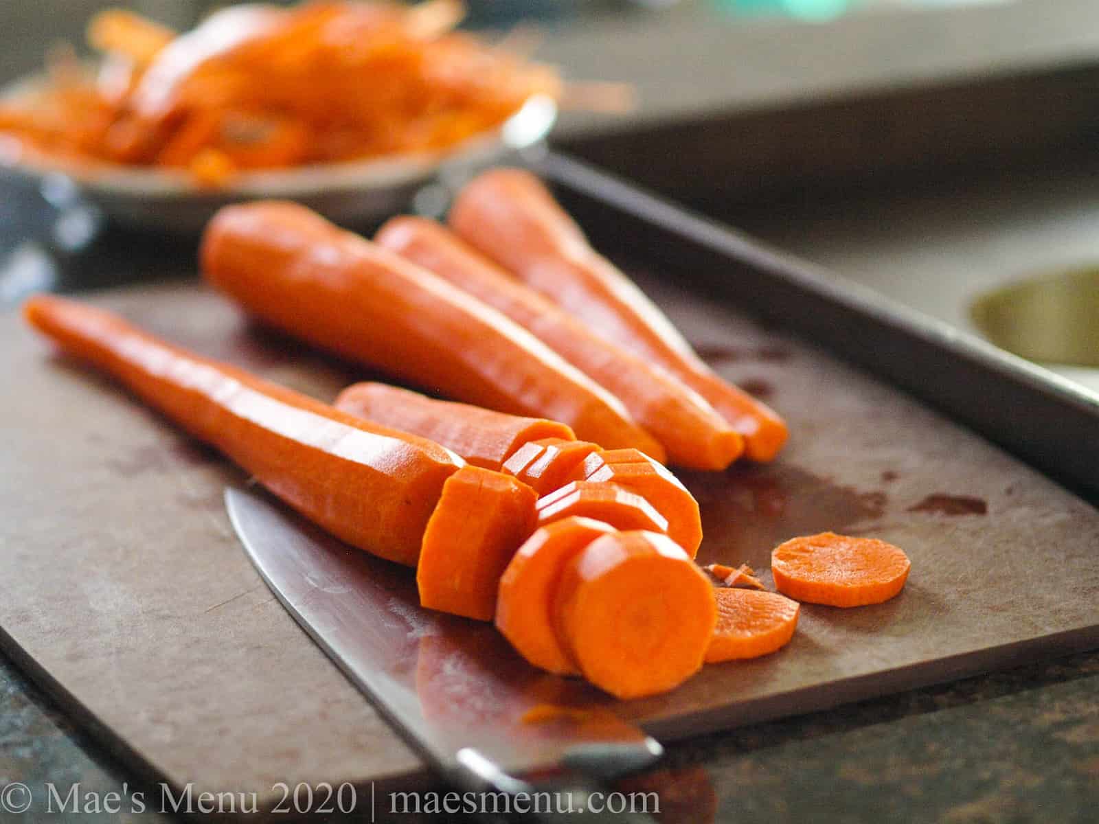 Cutting up carrots for Oven Roasted Turmeric & Cumin Carrots.