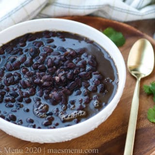 a large bowl of instant pot cuban black beans.