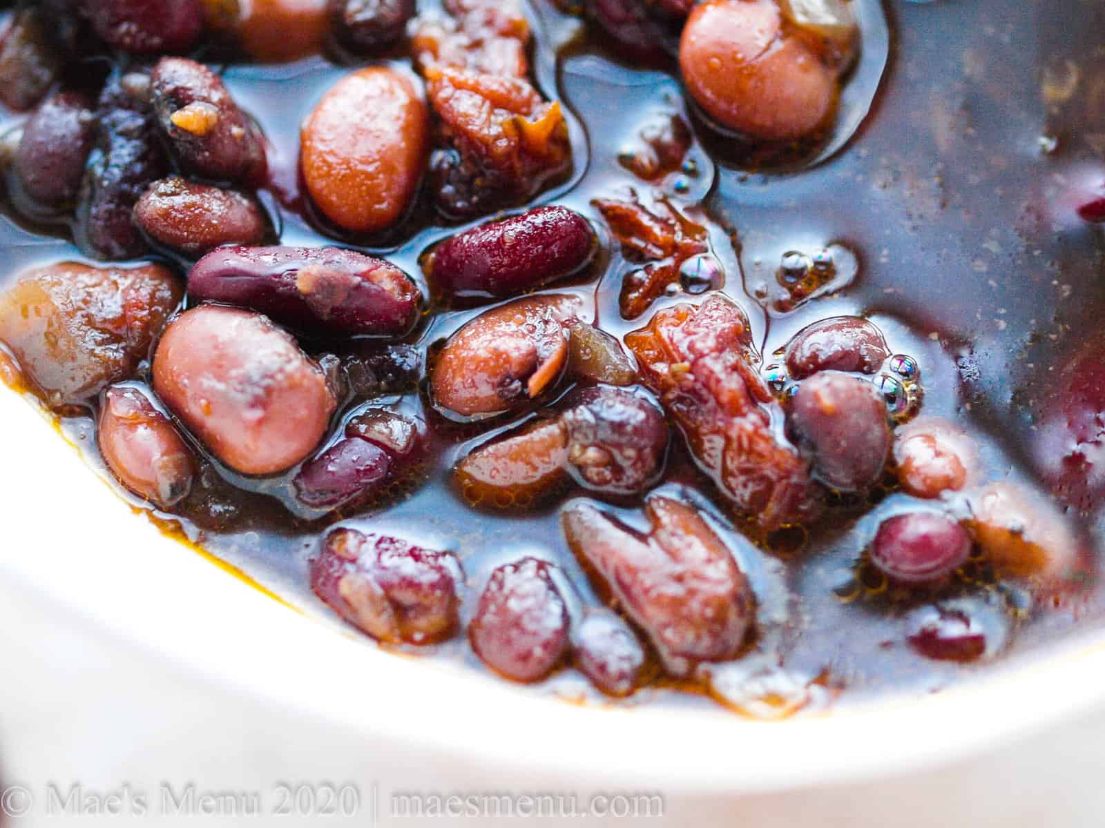 An up-close shot of maple baked beans.