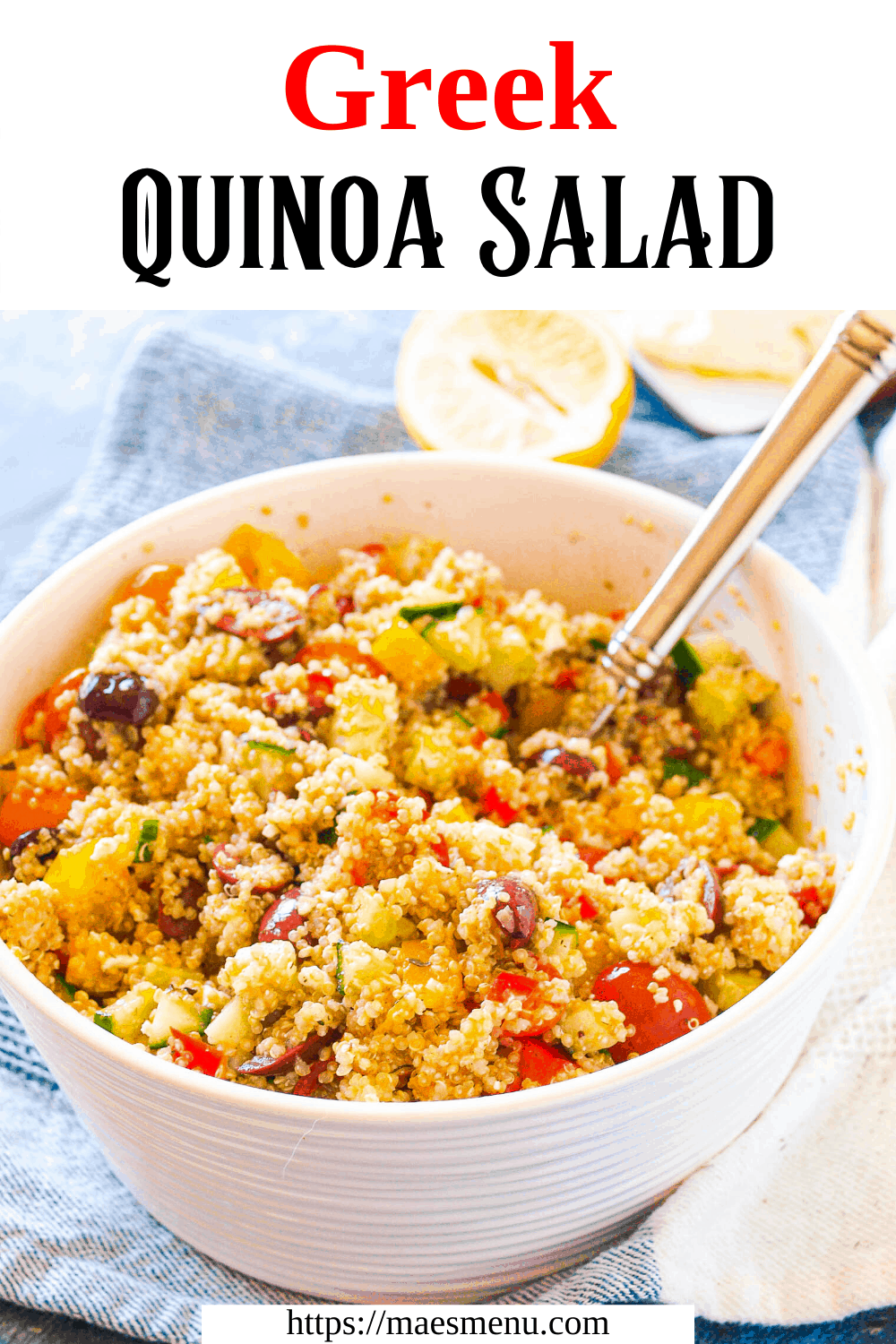 A pinterst pin for Greek Quinoa Salad. A large bowl of the salad sits in the center of the bowl with a large stainless steel serving spoon in it. 