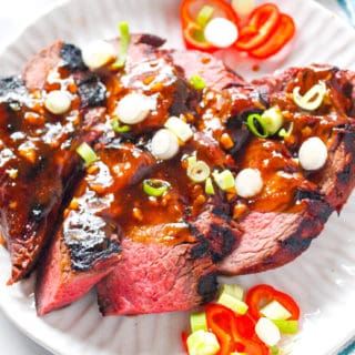 An overhead shot of a plate of grilled tri tip marinade