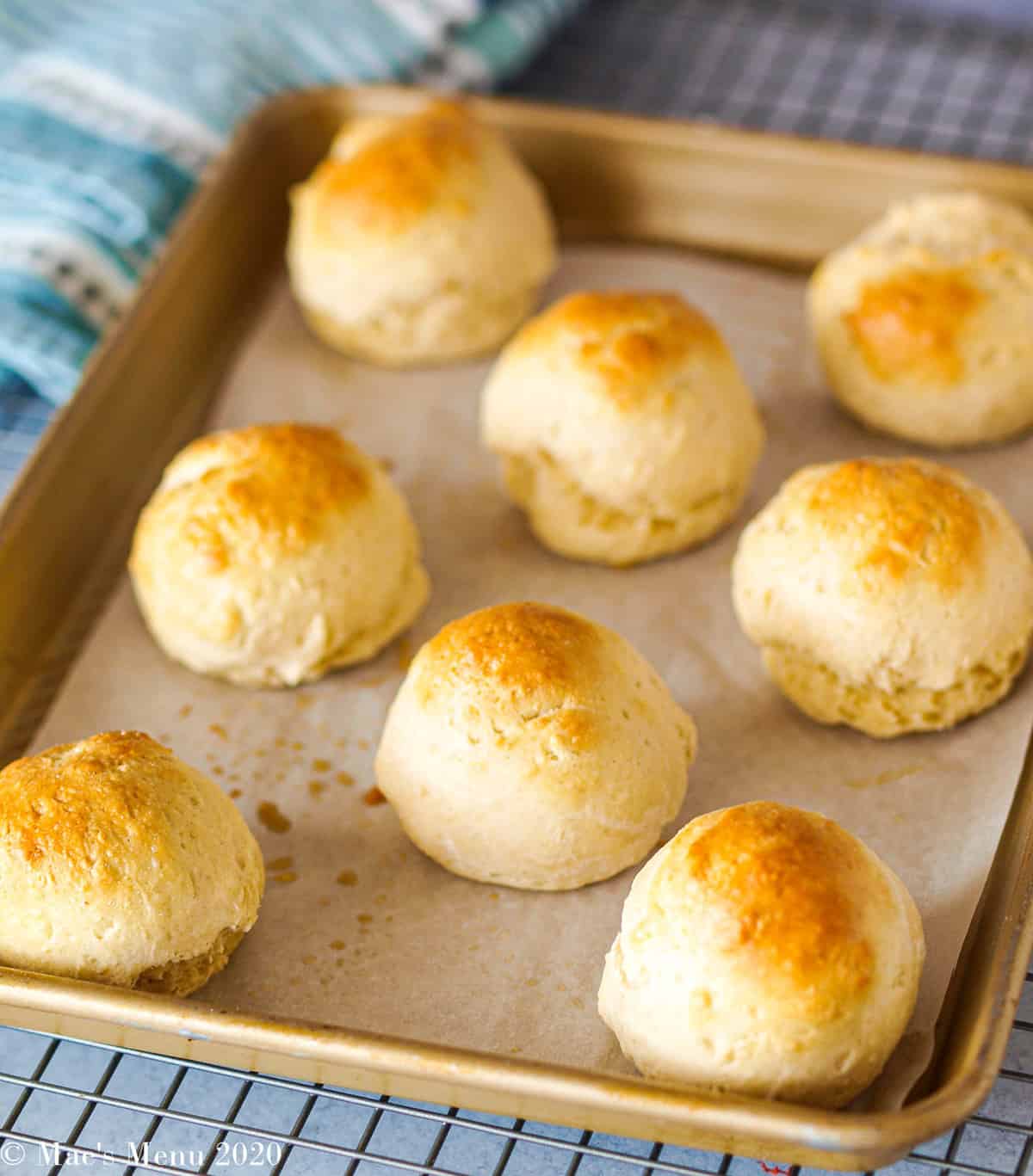 A sheet full of no yeast dinner rolls fresh out of the oven.