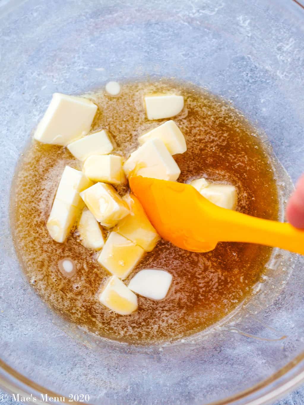 Mixing the butter and honey in the mixing bowl
