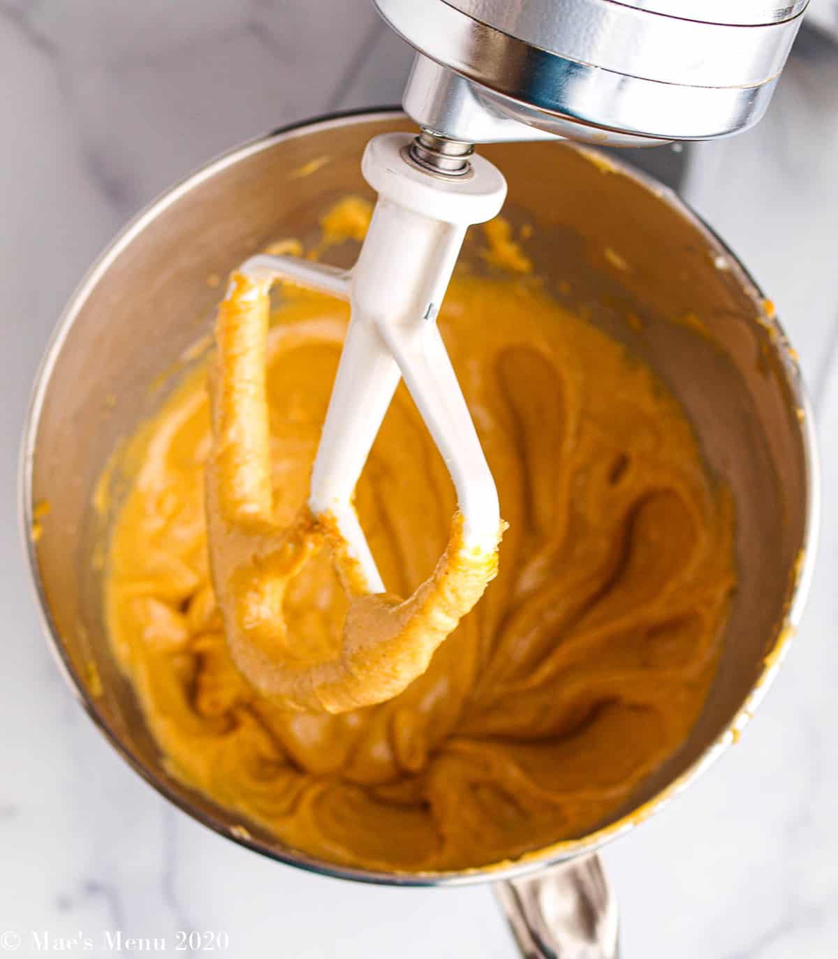 The creamed peanut butter mixture in a stand mixer 