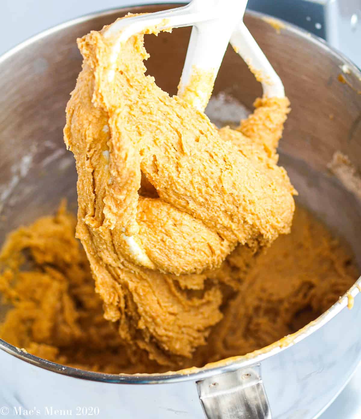 Whole wheat peanut butter cookie batter in a stand mixer
