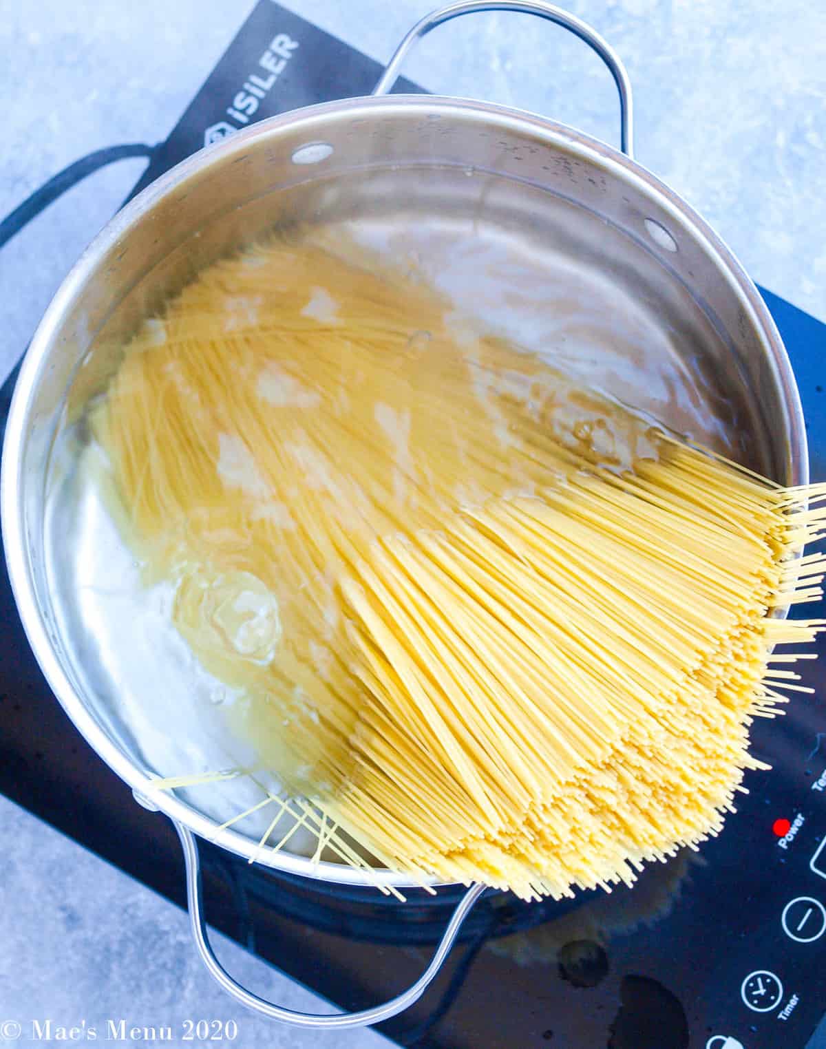 Boiling angel hair pasta in a stockpot