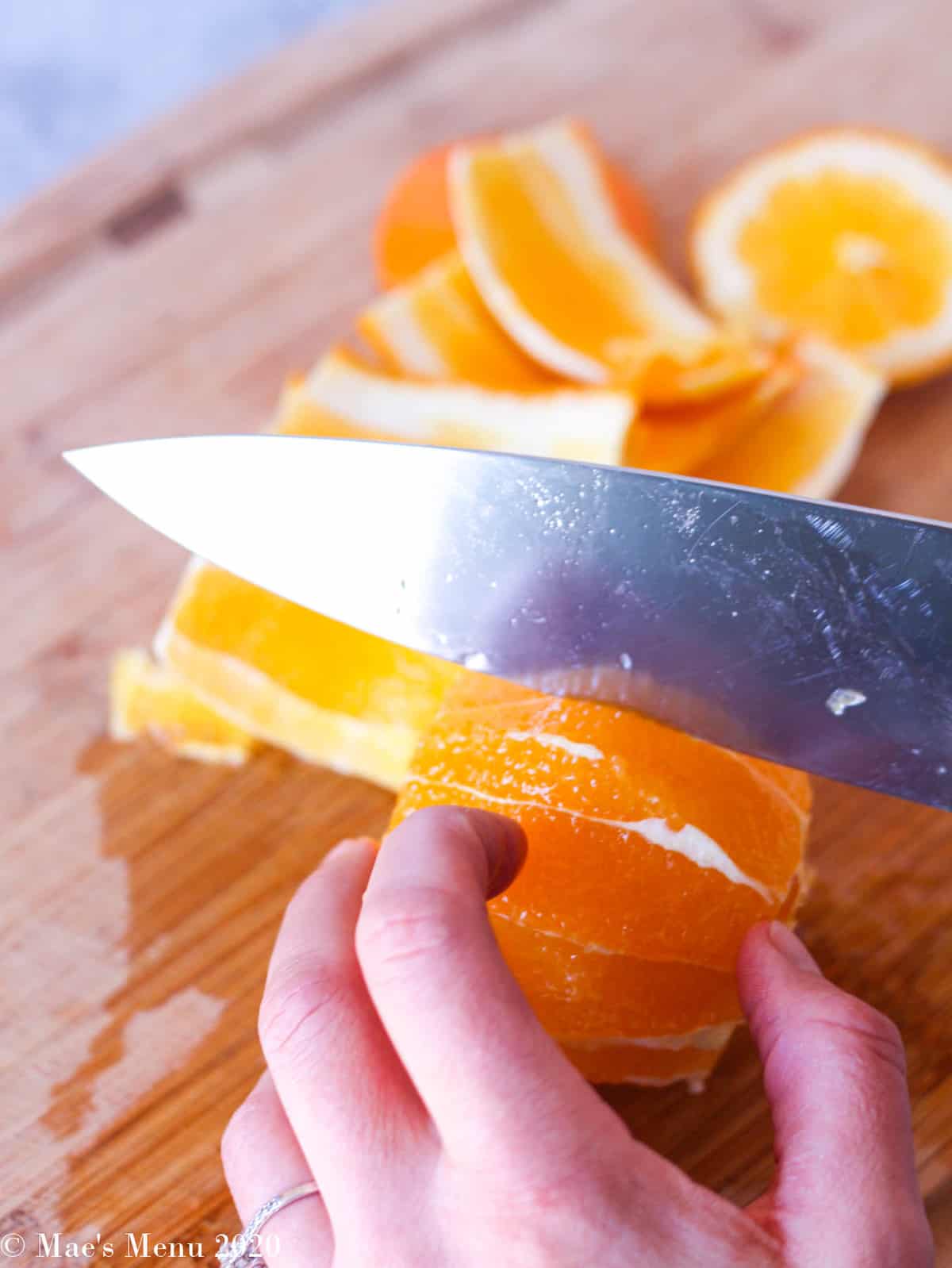 Cutting the segments out of the orange