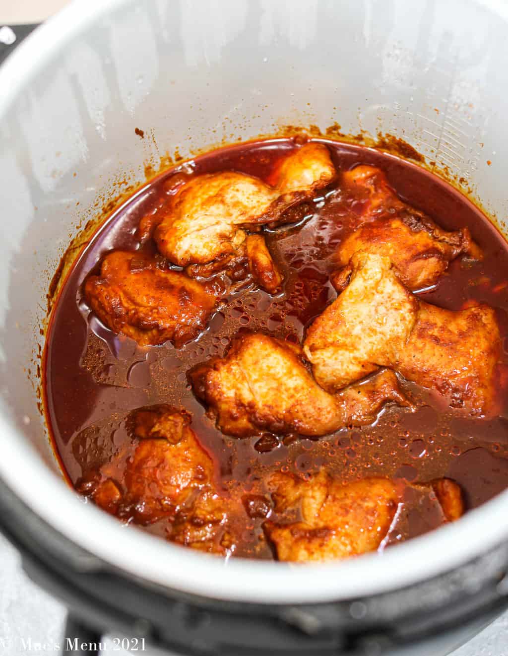 Cooked chicken in barbecue sauce in the instant pot 