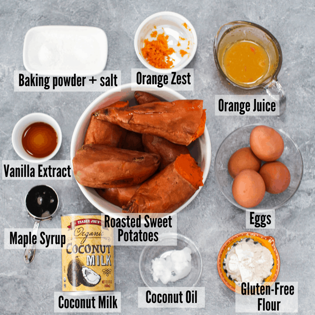 All of the ingredients for the healthy sweet potato souffle: sweet potatoes, baking powder + salt, orange zest, orange juice, eggs, vanilla extract, maple syrup, eggs, gluten-free flour, coconut oil, and coconut milk 