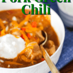 A pinterest pin for pork green chili with a white bowl of the chili.