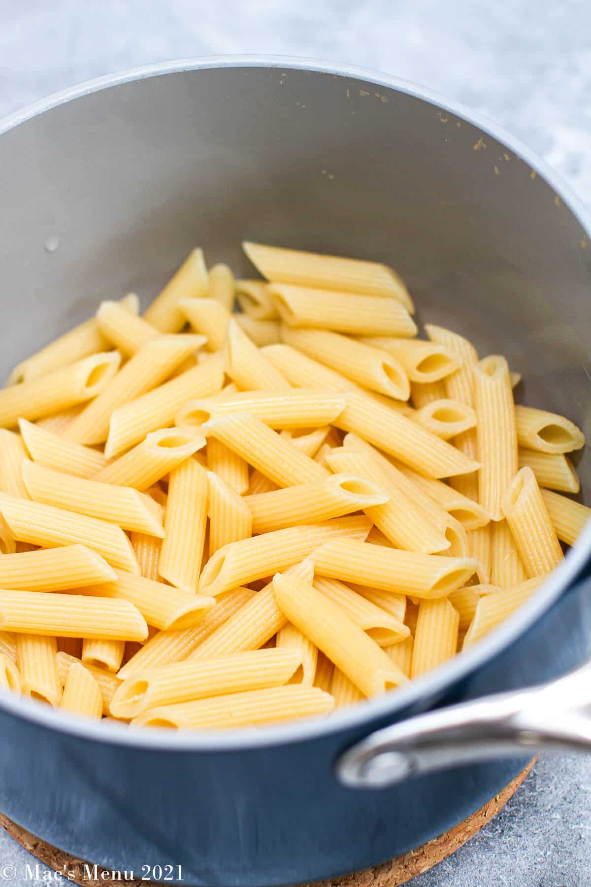 An overhead shot of a saucepan full of pasta