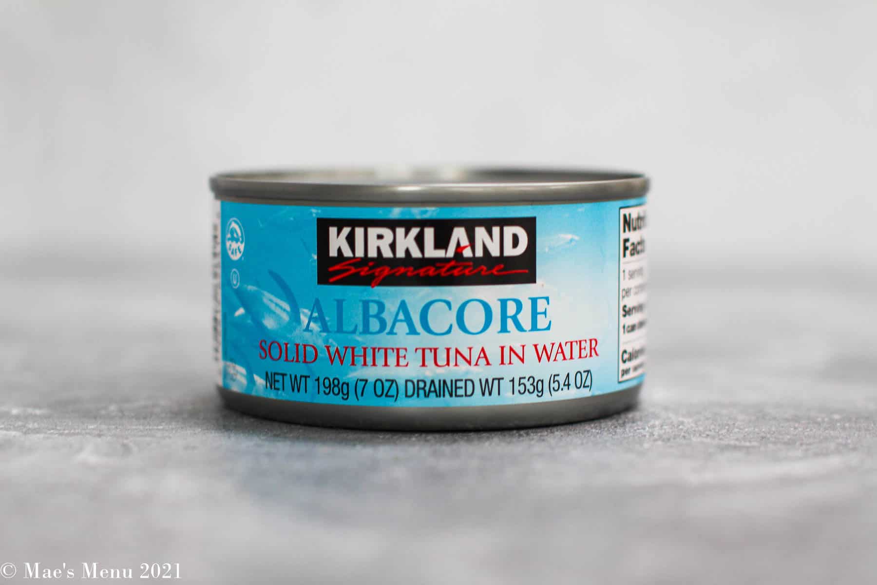 A front shot of a can of kirkland albacore tuna