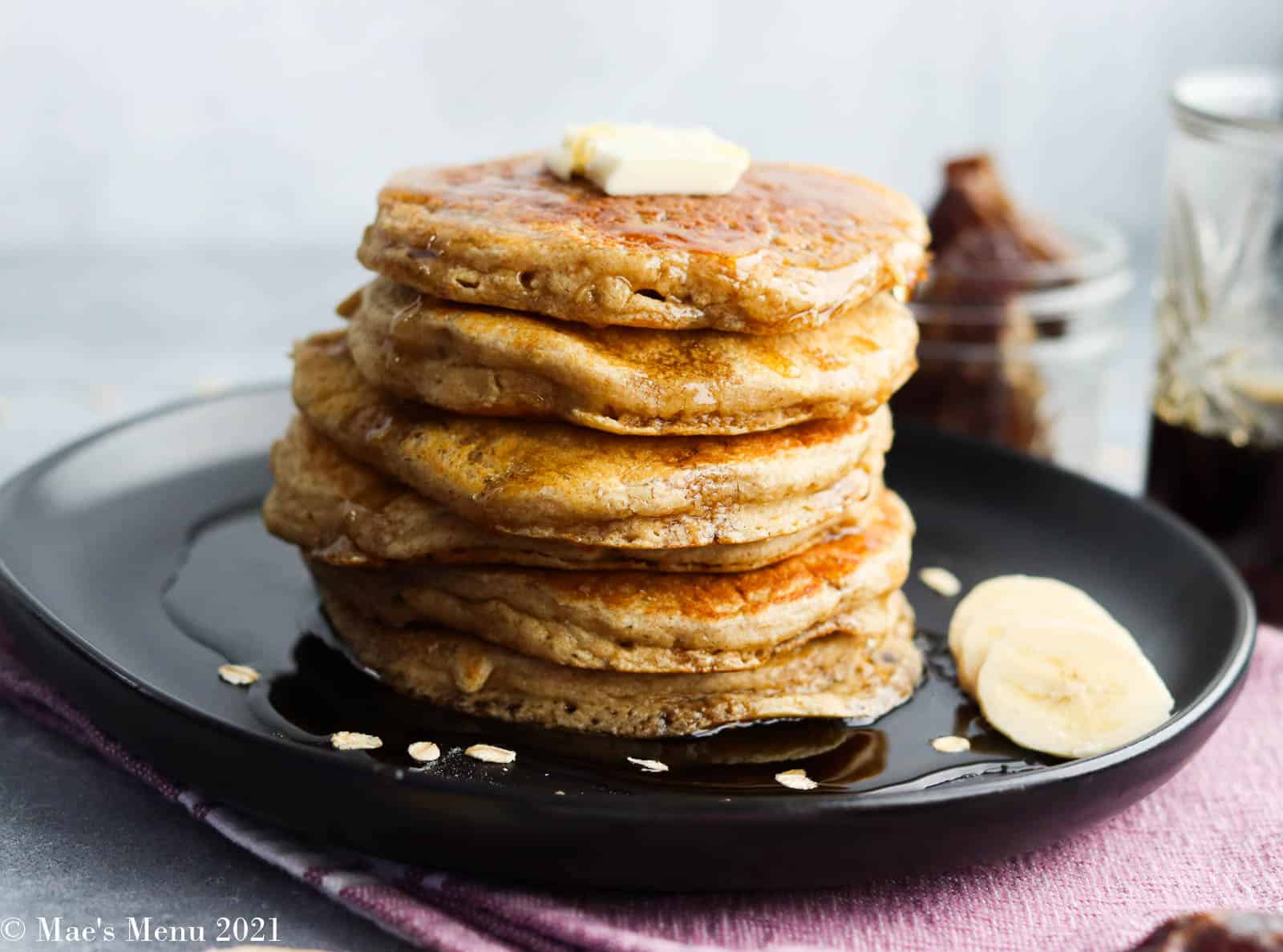 A side shot of a stack of oatmeal blender pancakes