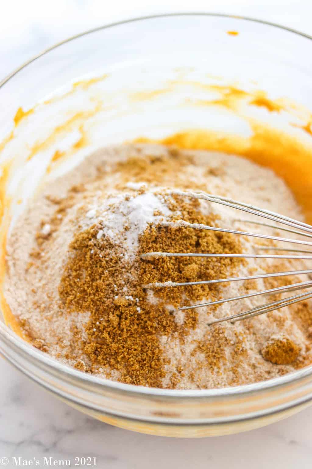 Flour, flaxseed, and baking soda in with the peanut butter and pumpkin mixture