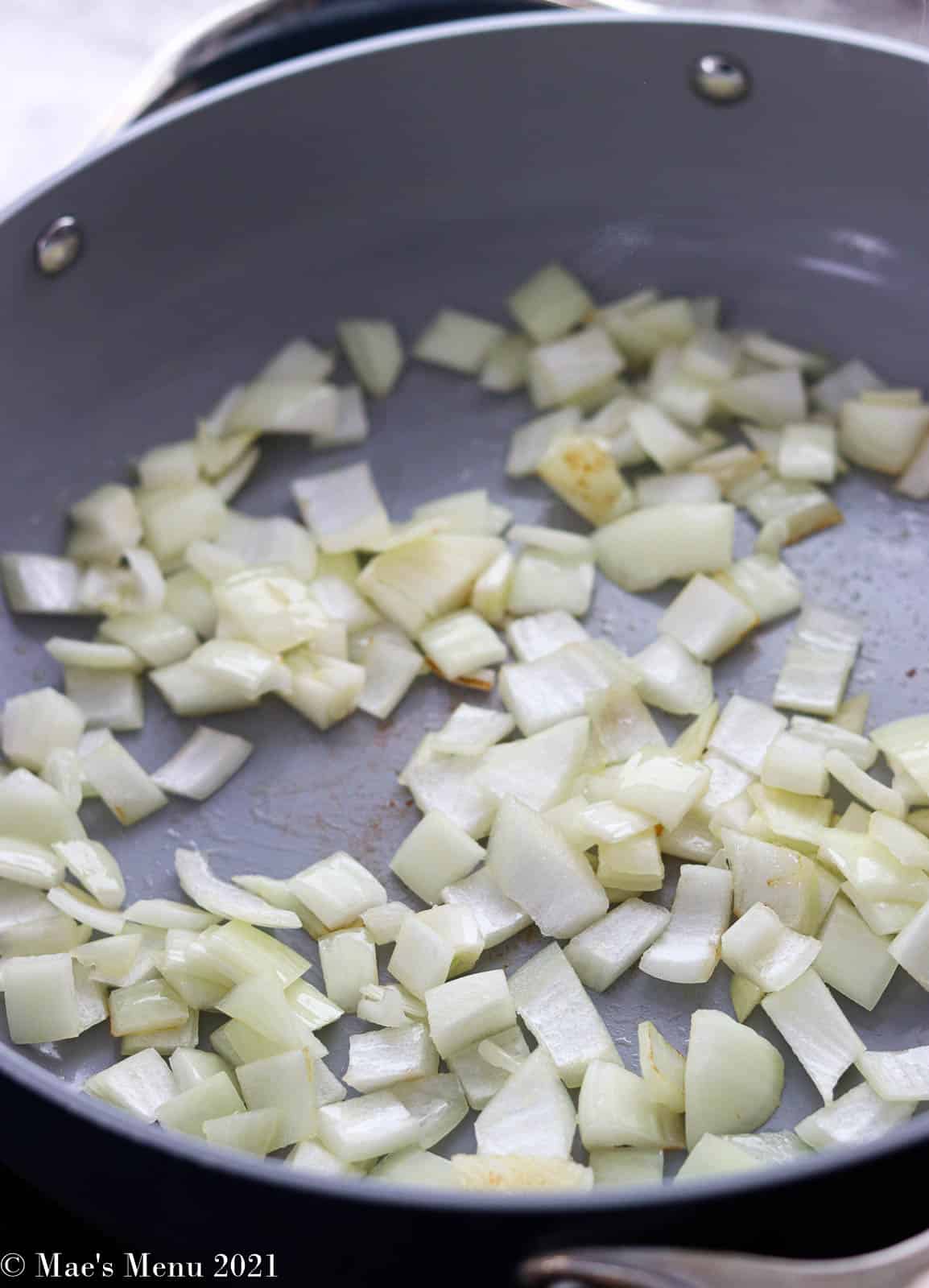 Onions sauteing in a pan