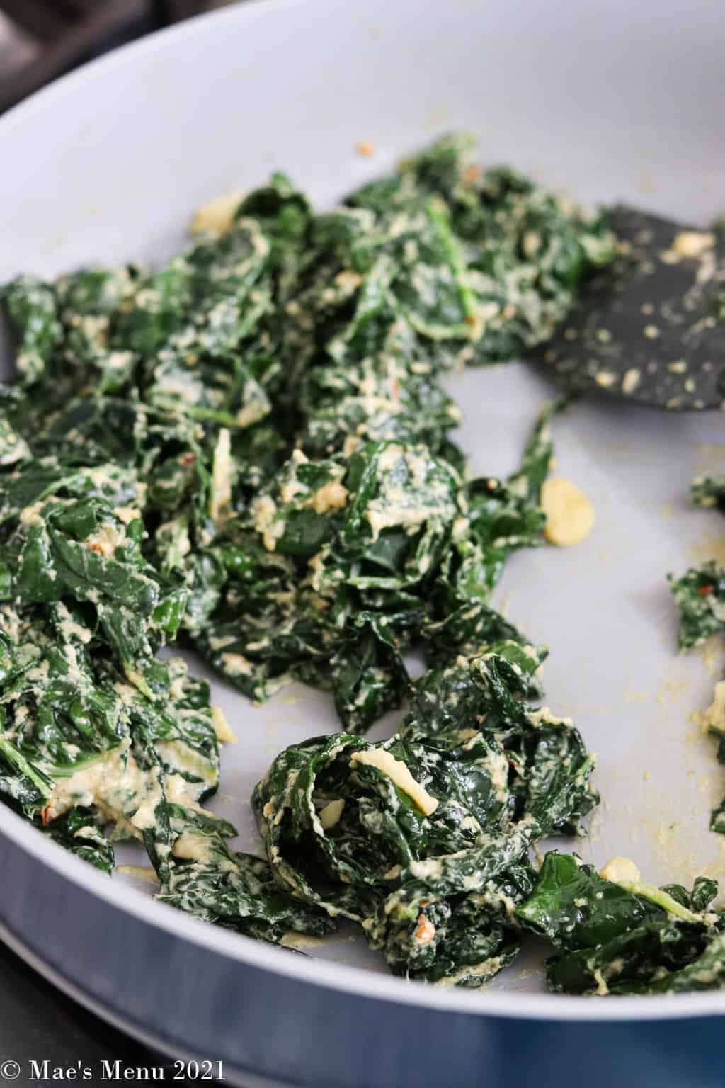 the warm kale salad tossed with the tahini salad dressing