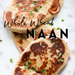 A pinterest pin for whole wheat naan with an overhead shot of the naan on a plate.