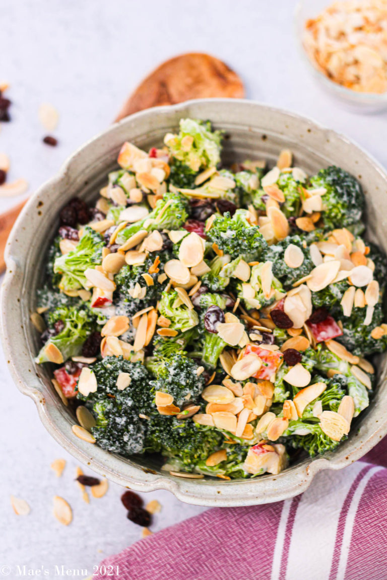 An overhead shot of the broccoli raisin salad in a serving bowl.