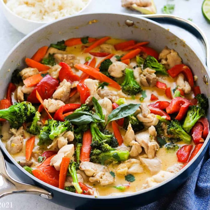 A large pan of thai green chicken curry