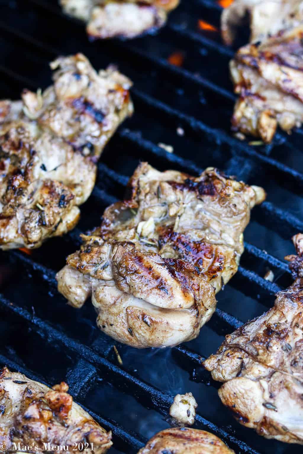 Grilled chicken thighs on the grill