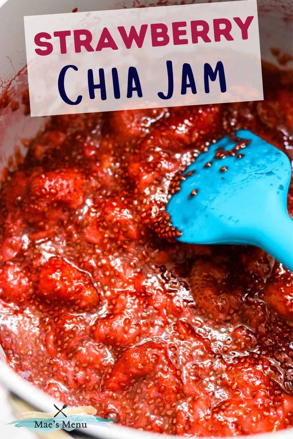 A pinterest pin for strawberry chia jam with an up-close shot of a saucepan of the jam