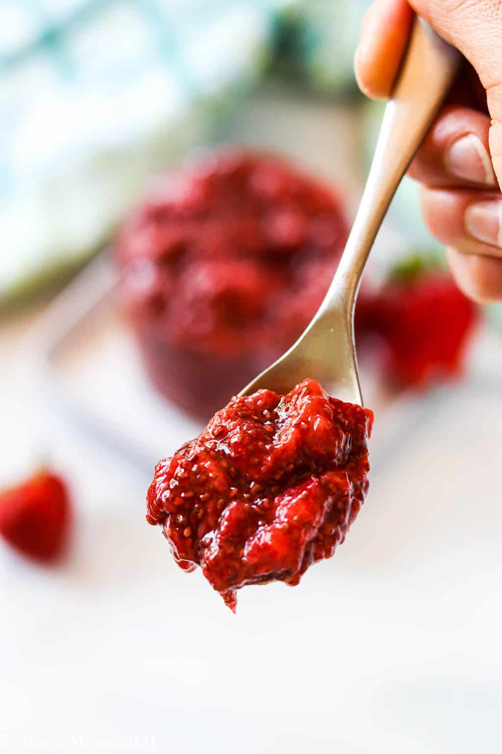An up-close scoop of strawberry chia jam