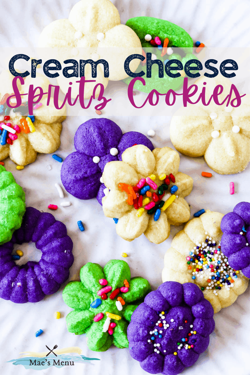 A pinterest pin for cream cheese spritz cookies with an up-close overhead shot of the cookies on a white dish