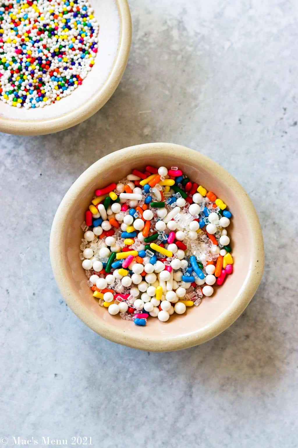 Two small dishes of sprinkles