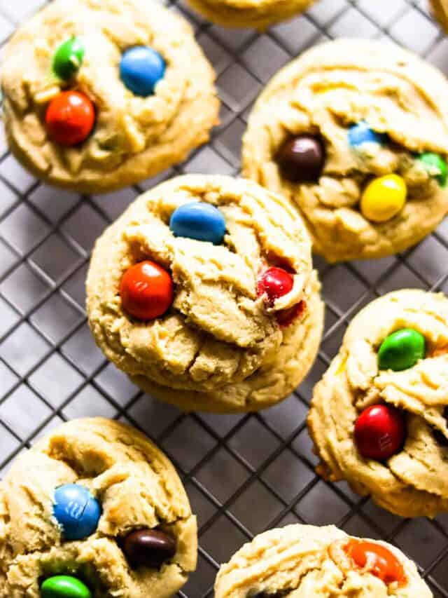 Peanut butter M&M cookies on a cooling rack