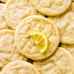 An overhead shot of lemon sugar cookies sacked on each other