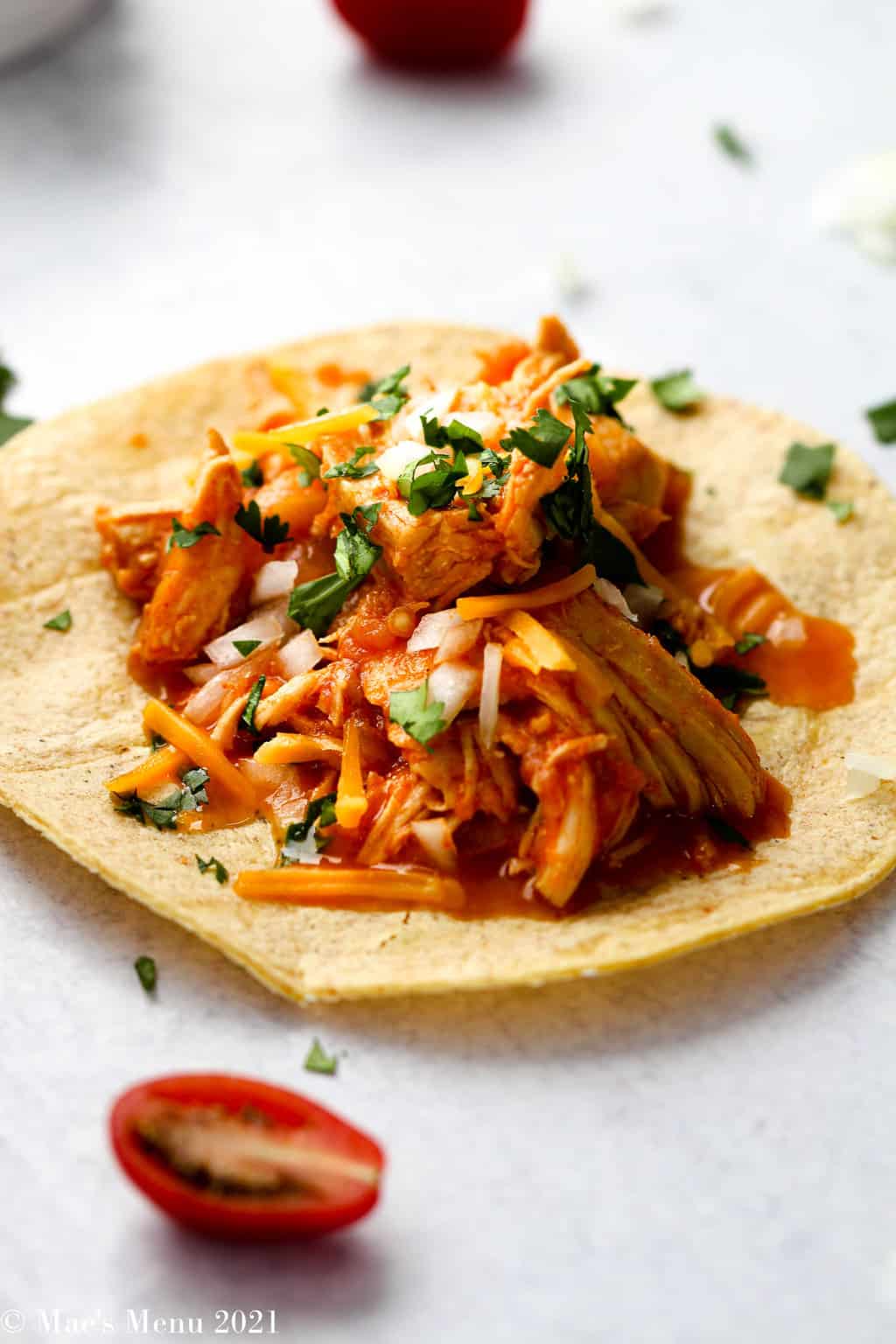 An up-close side shot of an instant pot shredded chicken taco