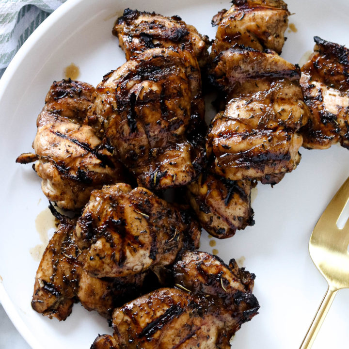 An up-close overhead shot of grilled chicken thighs
