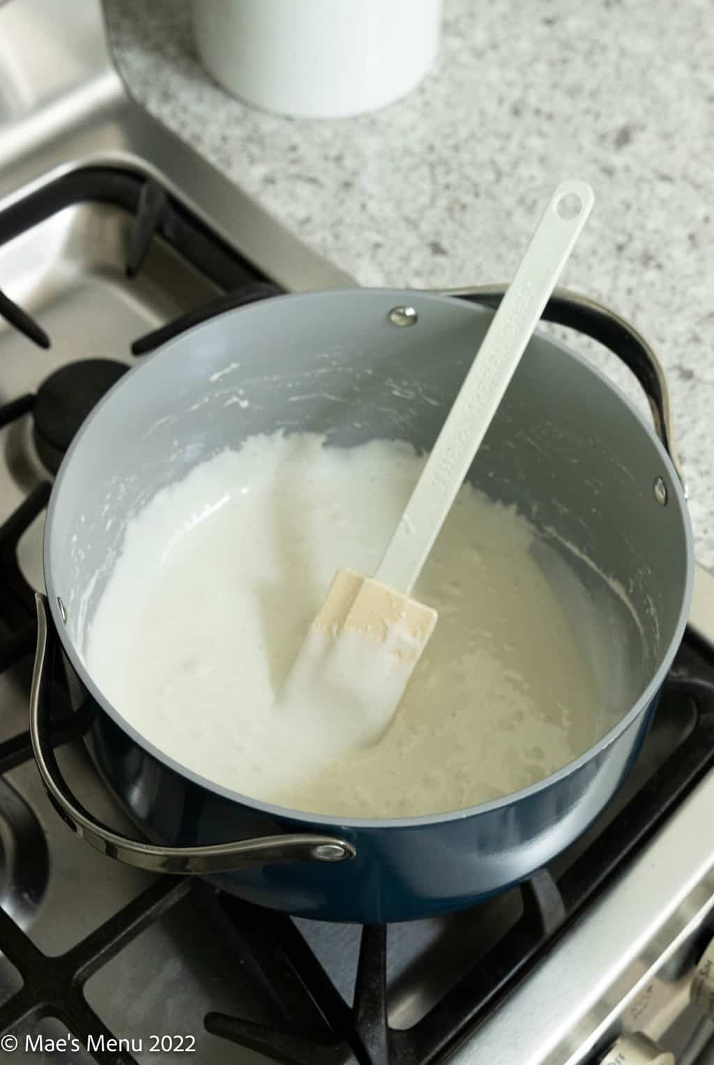 Melted marshmallows and butter in a large pot.
