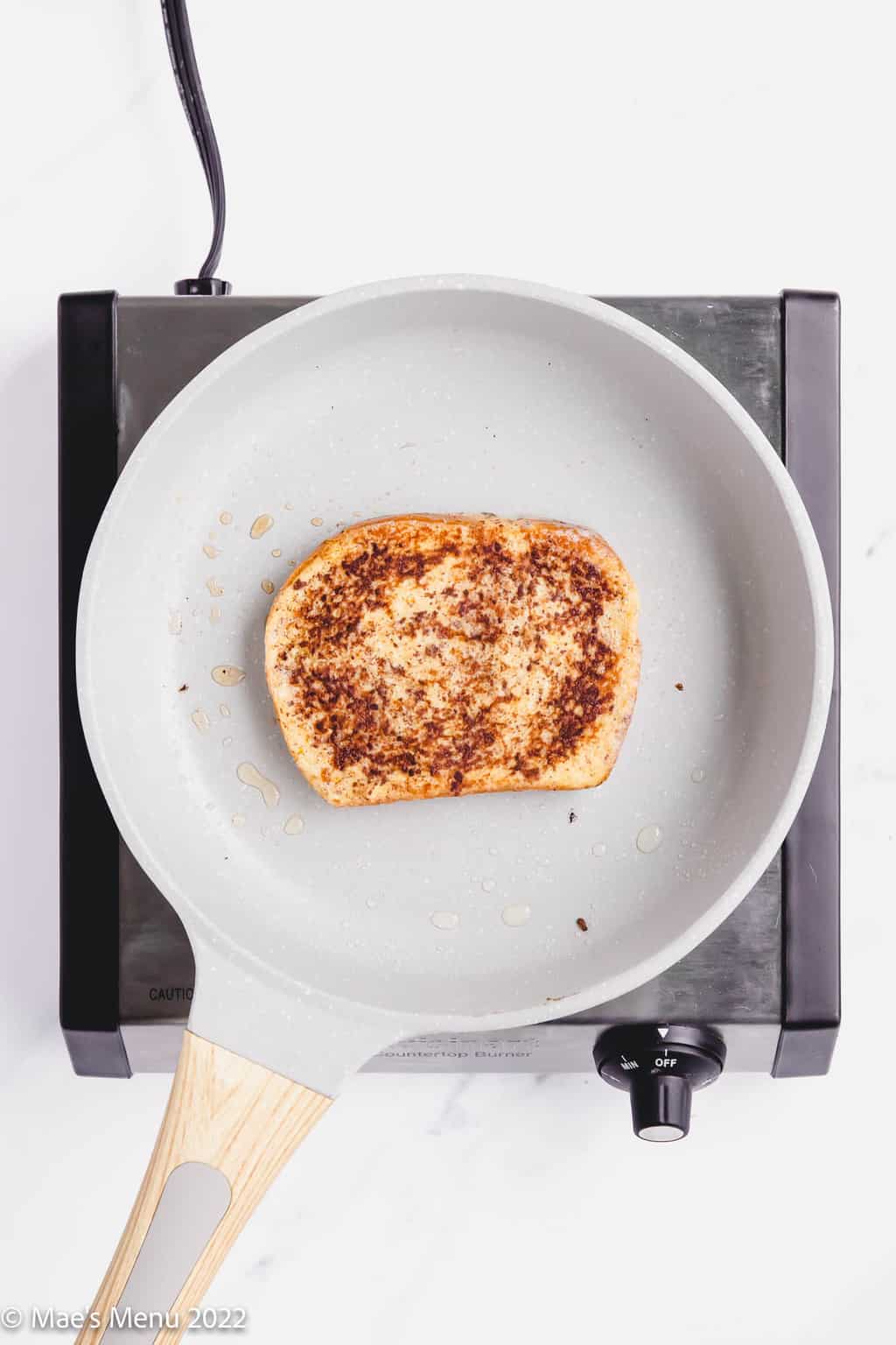 French toast in a frying pan.
