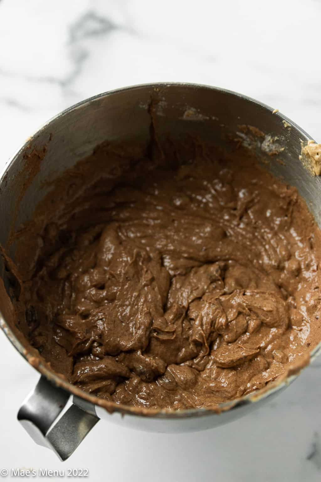 A mixing bowl of date cake batter.
