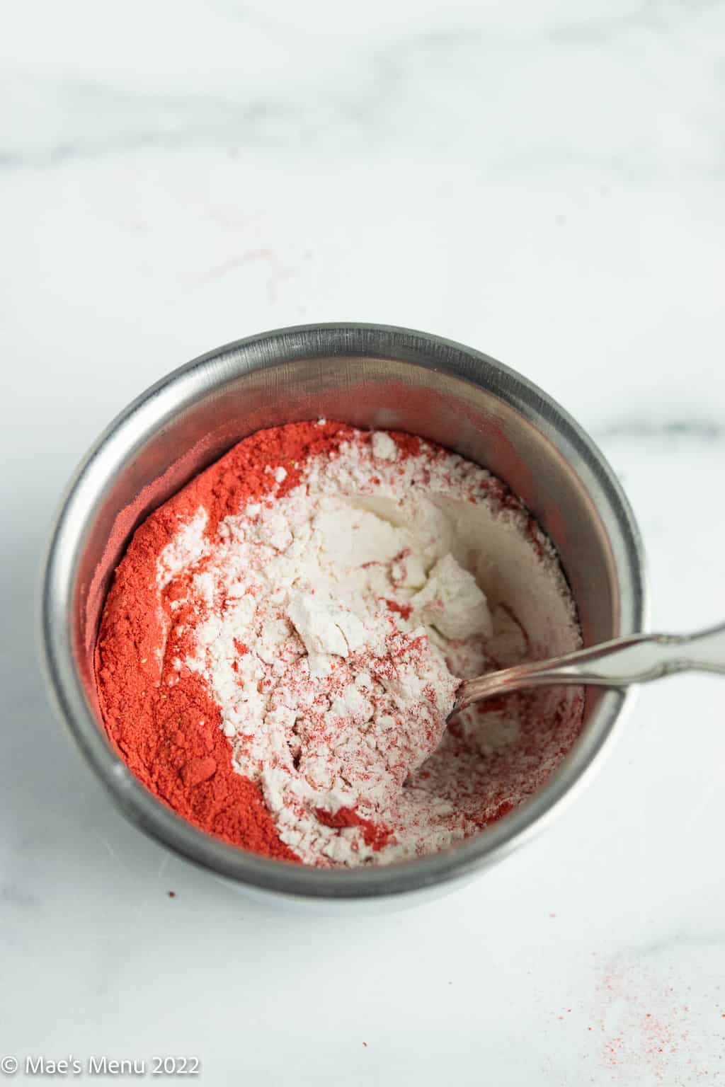 Strawberry powder and flour in a small mixing bowl.