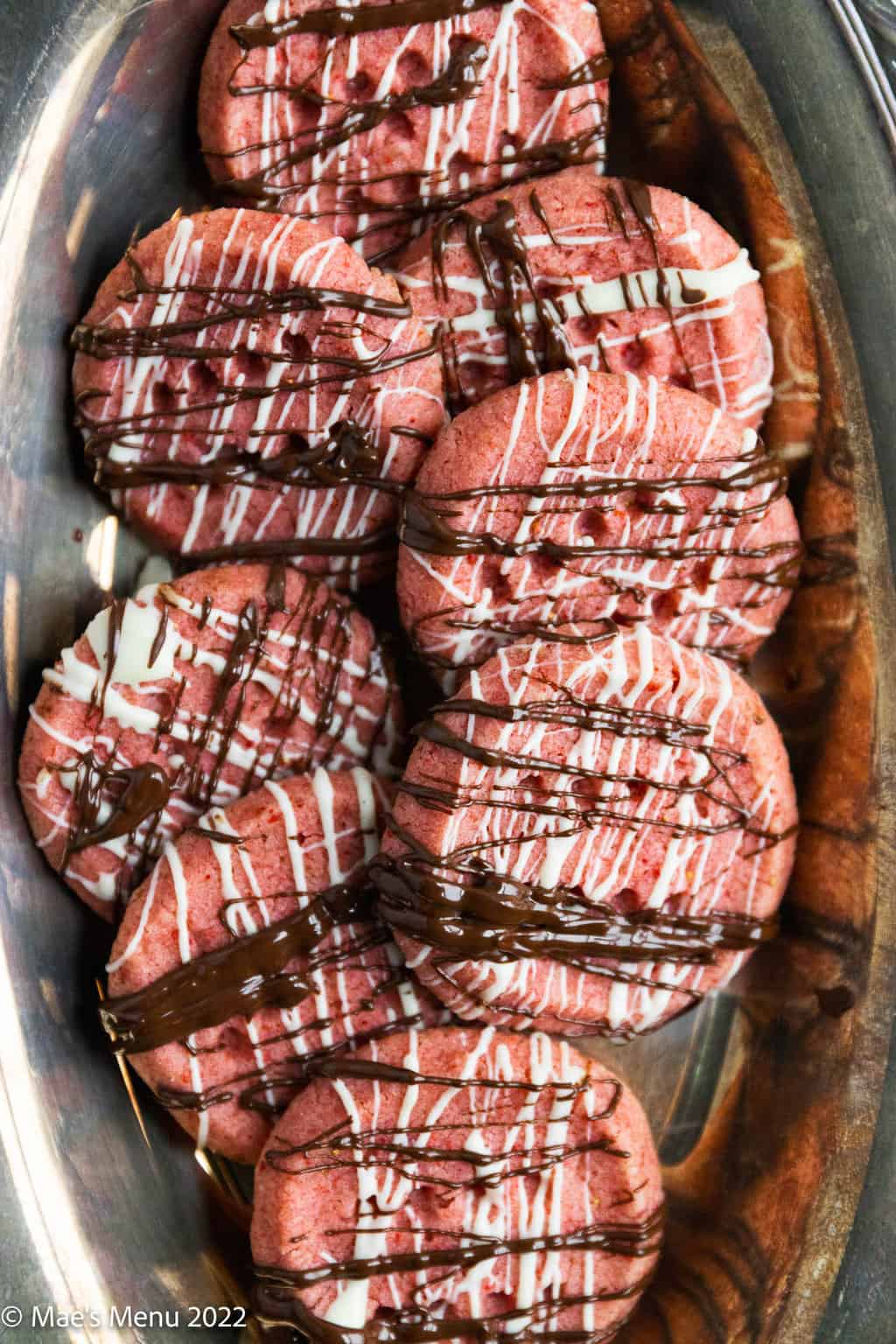 A serving platter of strawberry shortbread cookies.