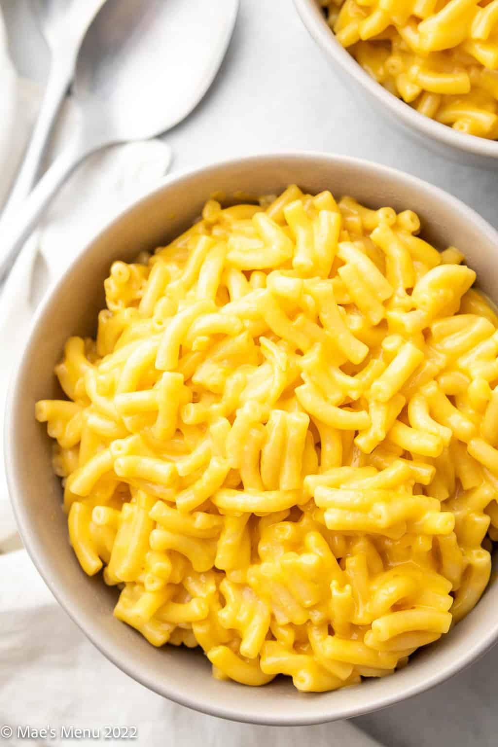 An up-close overhead shot of two bowls of kraft mac and cheese made in the Instant Pot.