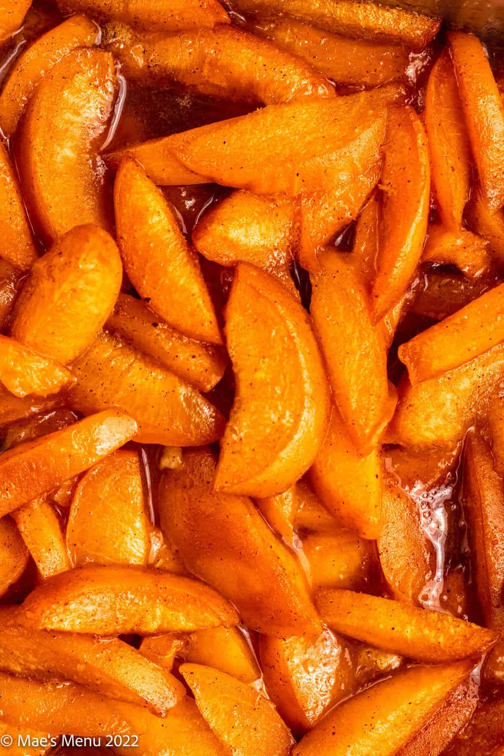 An up-close shot of baked apricot cobbler.