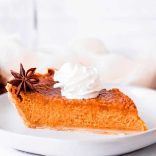 A side hsot of a pie of dairy free pumpkin pie.