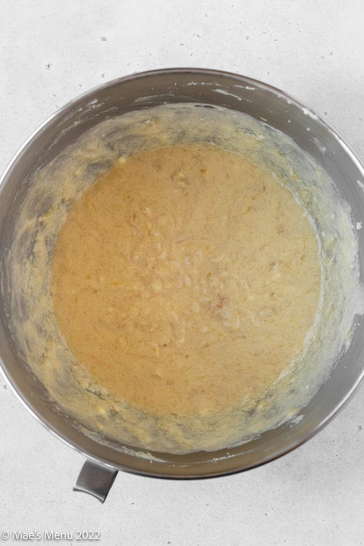 Banana bread batter before stirring in the flour mixture.