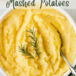 A pinterest pin for dairy-free mashed potatoes with an overhead shot of a white bowl of the mashed potatoes.