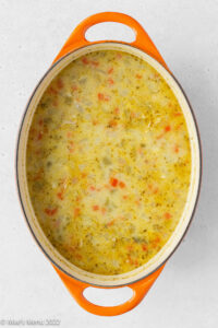 A large pot of creamy white chicken tortilla soup.