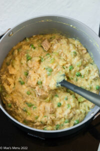 A large pan of the tuna and rice mixed in with the cheesy sauce.
