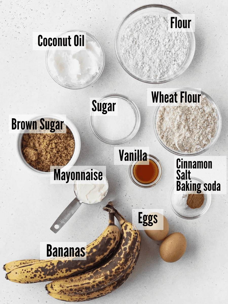ingredients for making dairy-free banana muffins measured out on a white tabletop.
