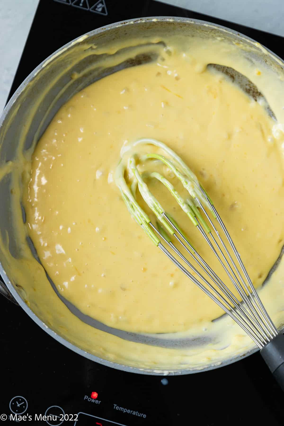 roux for dairy-free buffalo dip has thickened after cooking.
