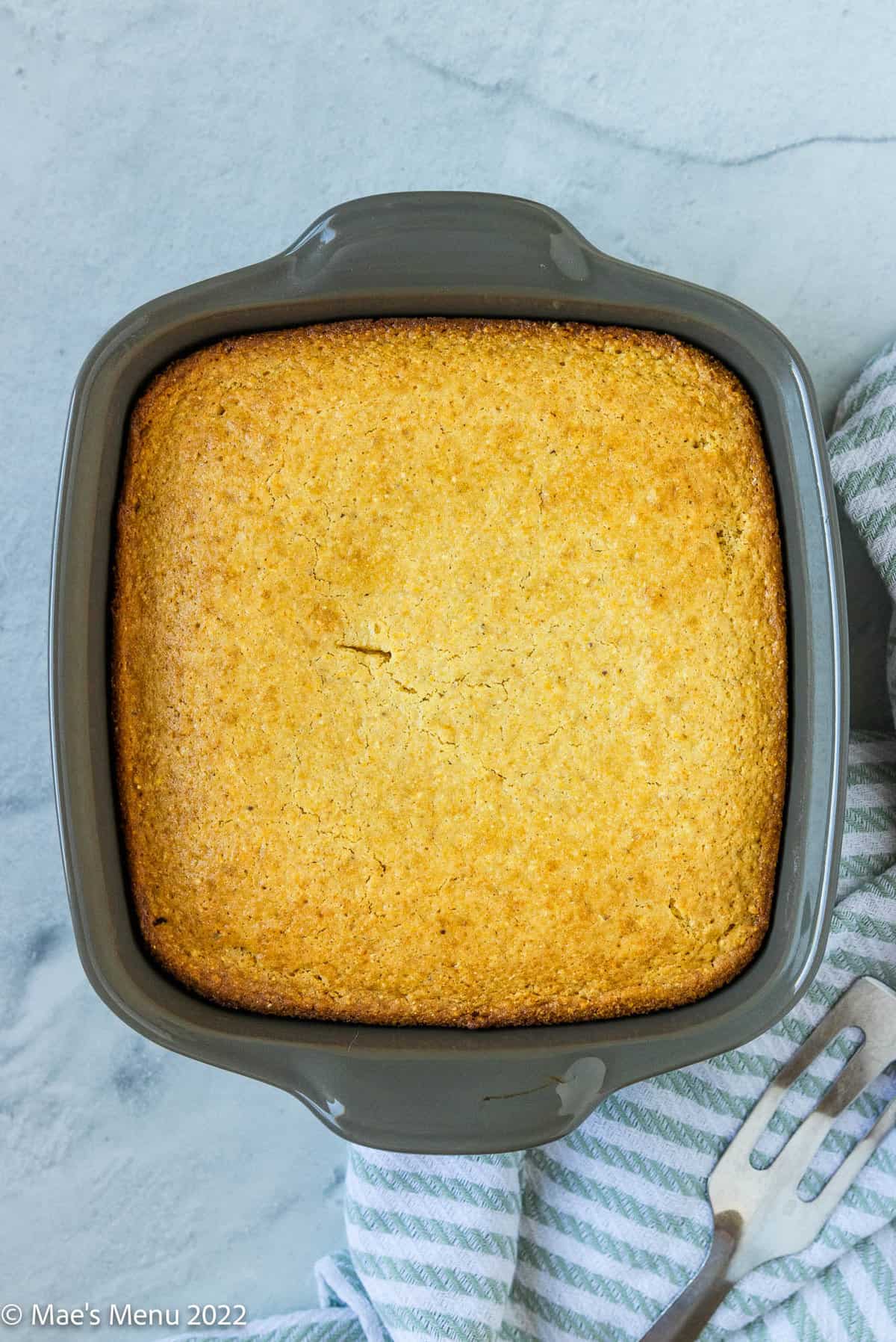 An overhead shot of a pan of cornbread without milk.